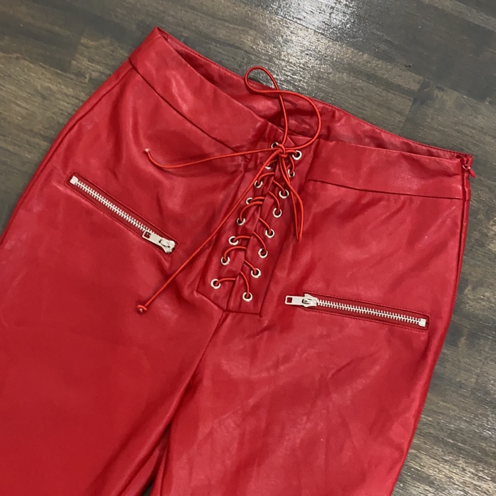 RED FAUX LEATHER PANTS